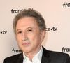 C'est dans son luxueux triplex du VIIe arrondissement de Paris qu'il a aménagé son propre espace d'entraînement.

Michel Drucker au photocall de la conférence de presse de France 2 au théâtre Marigny à Paris.
© Coadic Guirec / Bestimage