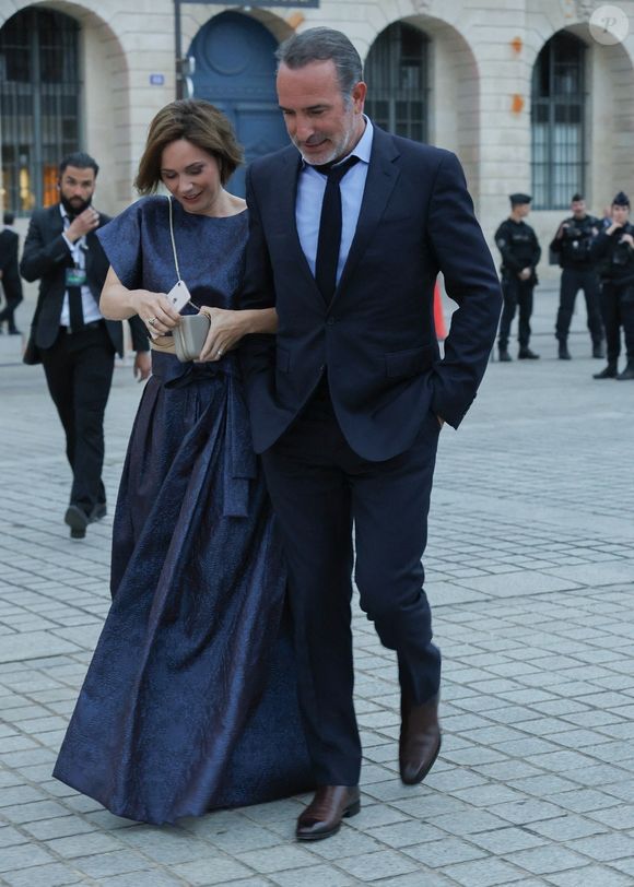 Exclusif - Jean Dujardin et Nathalie Péchalat arrivent à la cérémonie " 2023 Laureus World Sports Awards" à Paris le 8 mai 2023.