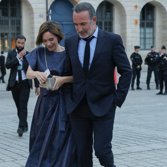 Exclusif - Jean Dujardin et Nathalie Péchalat arrivent à la cérémonie " 2023 Laureus World Sports Awards" à Paris le 8 mai 2023.