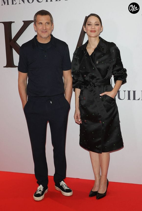 Une complicité évidente qui témoigne d'une relation apaisée et bienveillante après dix-huit ans de vie commune.

Guillaume Canet (réalisateur du film "Karma") et Marion Cotillard au photocall de la première du film "Karma" au cinéma Pathé Palace à Paris le 13 octobre 2026. 

© Coadic Guirec / Bestimage