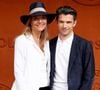 Le lendemain de ce jour particulier, la directrice du mécénat et des événements au Théâtre des Champs-Élysées a partagé une photo en noir et blanc du couple sur Instagram.

Julia Neugebauer et Gautier Capuçon au photocall du village lors des Internationaux de France de Tennis de Roland Garros 2026, à Paris, France, le 6 juin 2026. © Jacovides-Moreau/Bestimage