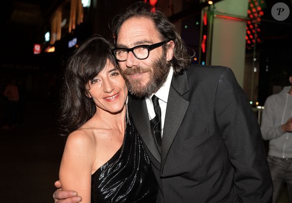 Mais à en croire leurs dires, tout le monde y trouve son bonheur !

Romane Bohringer et son ex-compagnon Philippe Rebbot - Personnalités lors de la 10ème cérémonie des Globes de Cristal au Lido à Paris, le 13 avril 2015. (VEEREN / BESTIMAGE).