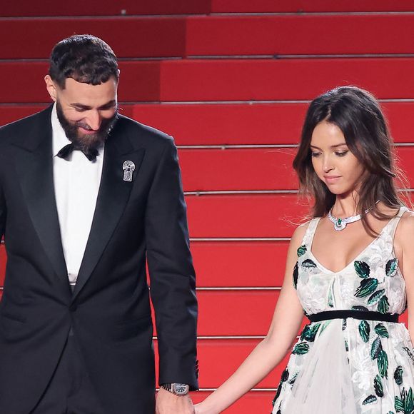 Karim Benzema et sa compagne Lyna Khoudri à la descente des marches du film " 13 jours 13 nuits " lors du 78ème Festival International du Film de Cannes. Le 23 mai 2025
© Jacovides-Moreau / Bestimage