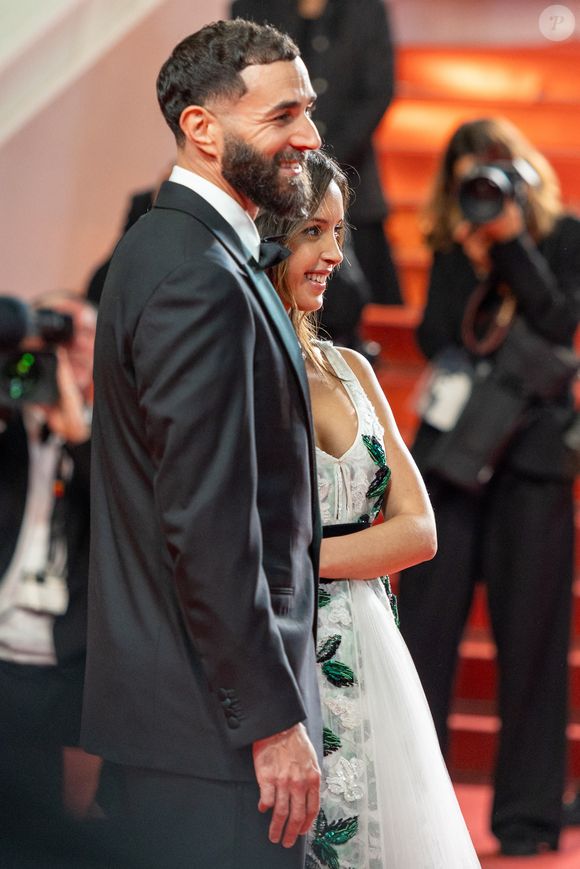 Karim Benzema et sa compagne Lyna Khoudri lors de la montée des marches du film « 13 jours 13 nuits » lors du 78ème Festival International du Film de Cannes. Le 23 mai 2025
© Jacovides-Moreau / Bestimage