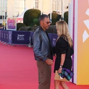 Roschdy Zem et sa compagne Sarah Poniatowski sur le tapis rouge lors de la première du film 'L'Invitation' pendant la 52ème édition du Festival du Cinéma Américain de Deauville, France, le 5 septembre 2026. © Denis Guignebourg/Bestimage