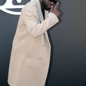 Le frère de Dadju est sur tous les fronts puisqu'il s'est récemment lancé en tant que promoteur dans un grand projet immobilier de luxe. 

Gims - Célébrités au Défilé Louis Vuitton, Collection Prêt-à-porter Printemps / Eté 2025 dans le cadre de la Fashion Week de Paris, France, le 1er Octobre 2024. 

© Bertrand Rindoff / Bestimage