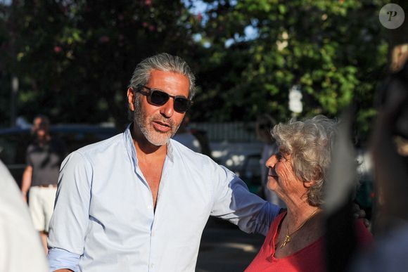 Exclusif - Ary Abittan, Jacqueline Franjou - Personnalités à l'exposition photographique de Paris Match "Eddie Barclay — Saint-Tropez, le sens de la fête !" place Blanqui à Saint-Tropez le 11 juillet 2025.

© Eternity / Bestimage
