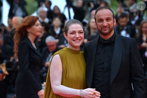 Emilie Dequenne et Michel Ferracci assistent au tapis rouge de la cérémonie d'ouverture de la projection du film Le Deuxième Acte lors de la 77e édition du Festival de Cannes au Palais des Festivals le 14 mai 2024 à Cannes, France. Photo by Franck Castel/ABACAPRESS.COM