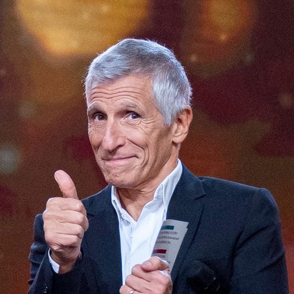 Dans "N'oubliez pas les paroles", Nagui s'entoure d'une grande équipe aux missions variées et toutes aussi importantes.

Exclusif - Nagui sur le plateau de l’émission “Unis pour Mayotte” diffusée en direct sur France 2, qui a permis de récolter plus de 5 millions de dons.

© Pierre Perusseau / Bestimage