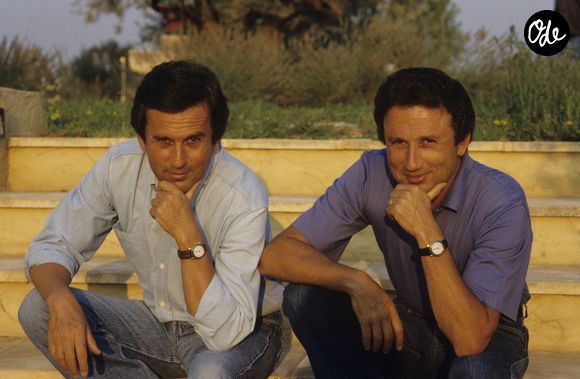 En effet, le frère de l'animateur fut successivement le directeur de RTL, France 2 et M6

Archives - En France, en vacances dans les Alpilles, Jean Drucker et son frère Michel Drucker. Août 1991
© Alain Canu via Bestimage