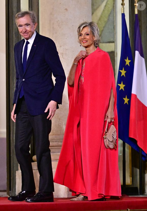 S'il a monté la fondation Louis Vuitton, ça n'est pas un hasard.
Bernard Arnault et sa femme Hélène Mercier au dîner d’état donné en l’honneur du président de l’Ouzbékistan au palais présidentiel de l’Elysée, à Paris, France, le 12 mars 2025. © Christian Liewig/Bestimage