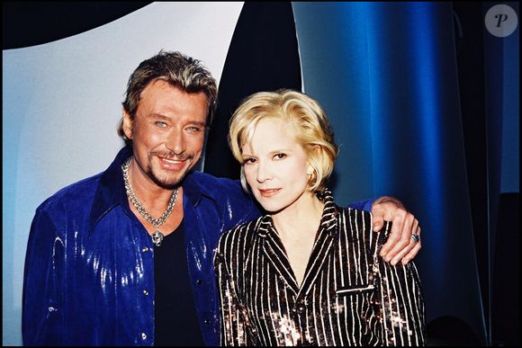 Sylvie Vartan évoque ensuite sa vie avec Tony Scotti, qu’elle a épousé en 1998.

Sylvie Vartan et Johnny Hallyday.
DANIEL ANGELI / BESTIMAGE
