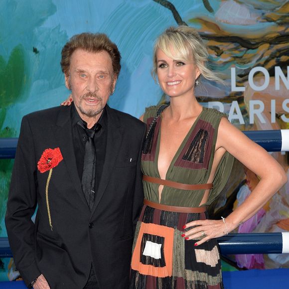 Exclusif - Johnny Hallyday et sa femme Laeticia Hallyday - Soirée au profit de l'Association "La Bonne étoile" de Laeticia Hallyday lors du 3ème Longines Paris Eiffel Jumping à la plaine de Jeux de Bagatelle à Paris le 1er juillet 2016 dans le Pavillon Eiffel du Longines Paris Eiffel Jumping décoré par Luxury Living.
© Olivier Borde / Veeren / Bestimage