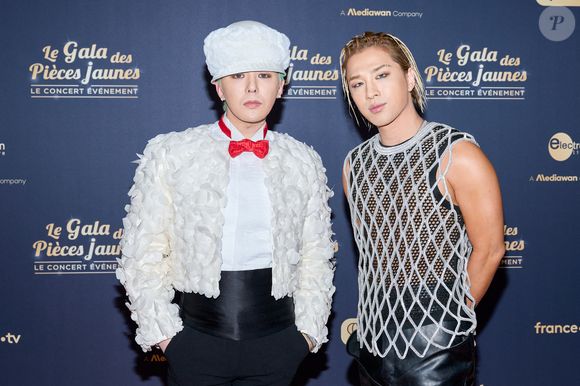 Exclusif - G Dragon et Taeyang au photocall du "Gala des pièces jaunes, le concert événement" à La Défense Arena à Nanterre le 23 janvier 2025. Le gala des Pièces Jaunes 2025 sera diffusé le 28 janvier, sur France 2 et sur la plateforme France.Tv.

© Jacovides / Moreau / Bestimage