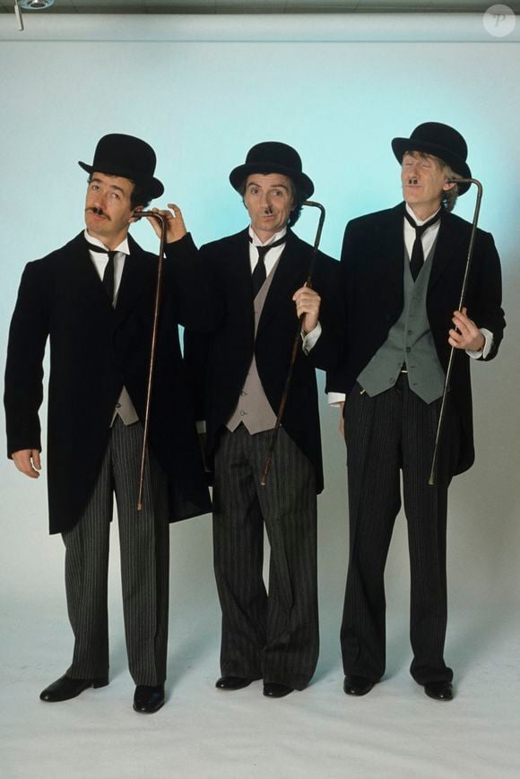 Archives - En France, à Paris, portrait en studio du groupe de comiques Les Charlots, Gérard Rinaldi, Gérard Filippelli, Jean Sarrus le 31 janvier 1985. Michel MARIZY via Bestimage