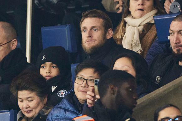 Ragnar Le Breton dans les tribunes lors du match de Ligue Des Champions 2024-2025 (LDC) "PSG - Brest (7-0)" au Parc Des Princes, le 19 février 2025.
© Cyril Moreau/Bestimage