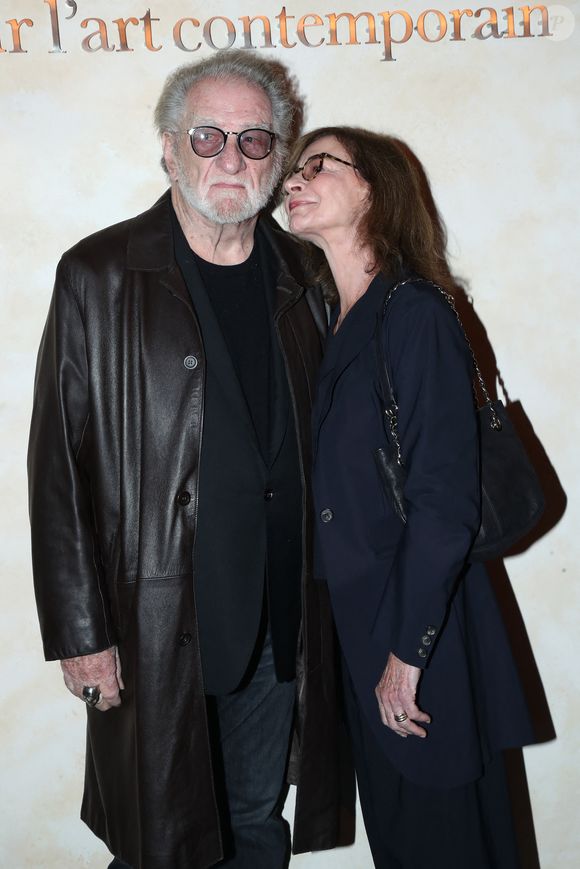 Eddy Mitchell et sa femme Muriel Bailleul - « Voir venir Venir voir », Célébration des 40 ans de la Fondation Cartier pour l'art contemporain avec la « Traversée du chantier de la nouvelle Fondation Cartier »,  place du Palais Royal, dont l'ouverture se fera en décembre 2025. Paris, France, le 18 octobre 2024. © Bertrand Rindoff/Bestimage