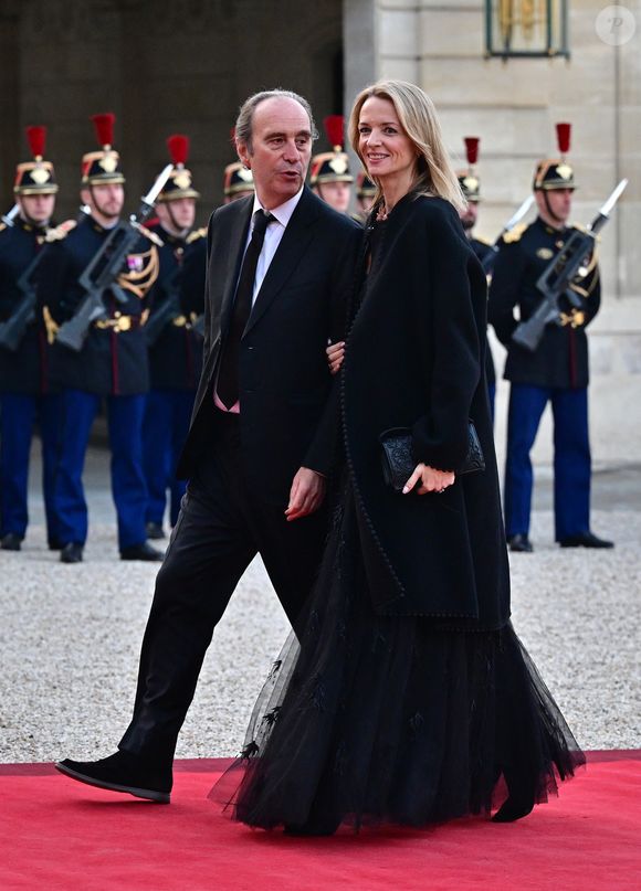 Xavier Niel et sa compagne Delphine Arnault, Pdg de Dior - Arrivées au dîner d'état au palais de l'Elysée à Paris donné en l'honneur du roi et de la reine de Danemark le 31 mars 2025.

© Christian Liewig / Bestimage