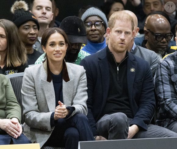 "Ils grandissent et changent. J'aime les questions qu'ils posent, les expériences et les défis qu'ils vous lancent. C'est formidable". 

Le prince Harry et Meghan Markle à Vancouver au Canada pour les Invictus Games 
Crédit : Mirrorpix / Bestimage