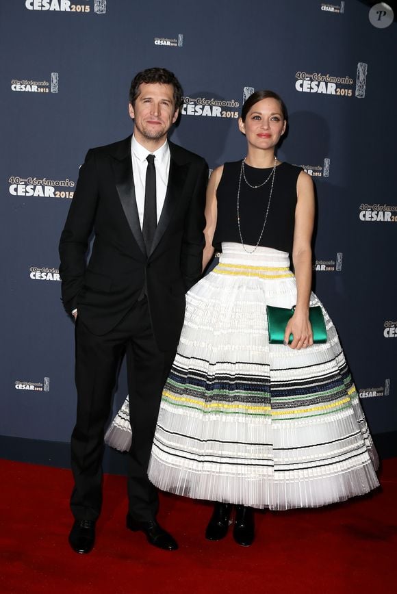 Guillaume Canet et Marion Cotillard - Photocall de la 40ème cérémonie des César au théâtre du Châtelet à Paris. Le 20 février 2015. BORDE-JACOVIDES / BESTIMAGE