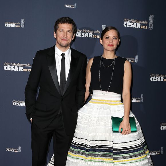 Guillaume Canet et Marion Cotillard - Photocall de la 40ème cérémonie des César au théâtre du Châtelet à Paris. Le 20 février 2015. BORDE-JACOVIDES / BESTIMAGE