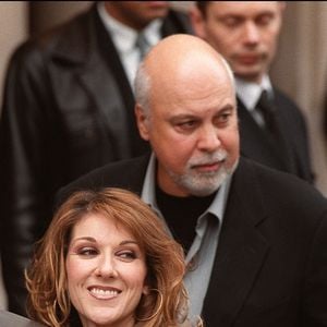 Céline Dion quitte son hôtel avec son mari/manager René Angelil. Paris, le 20 mars 2002. © ABACA