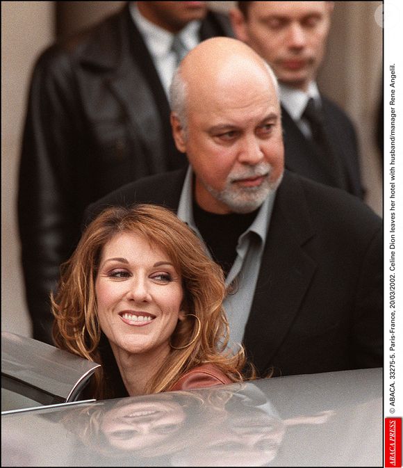 Céline Dion quitte son hôtel avec son mari/manager René Angelil. Paris, le 20 mars 2002. © ABACA