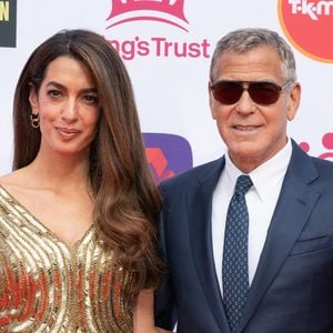 Amal Clooney et George Clooney assistent à la célébration du 50e anniversaire du King's Trust, organisée au Royal Albert Hall, à Londres, au Royaume-Uni. 
STARMAX / BESTIMAGE
