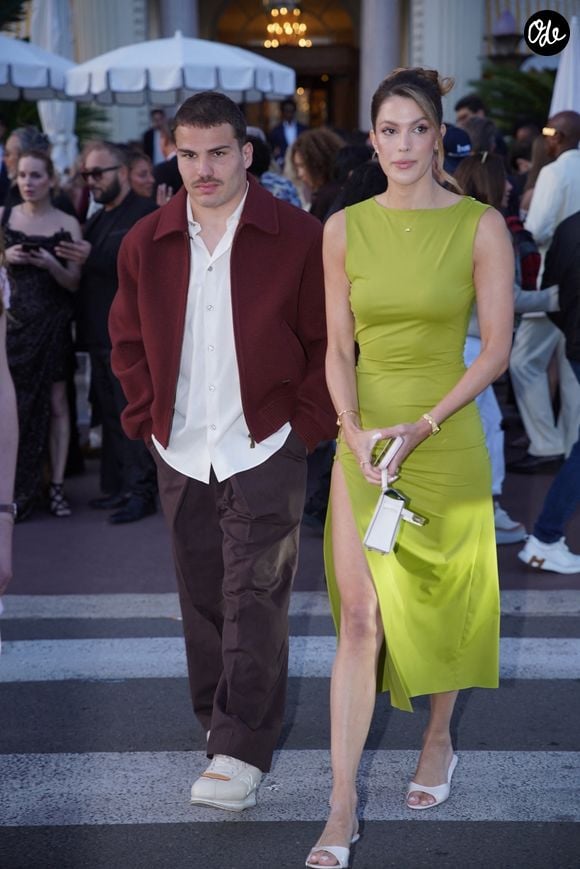 Exclusif - Iris Mittenaere (Miss France 2016 - Miss univers 2017) et son compagnon Antoine Dupont arrivent à la soirée "Kilian Paris" sur la plage du Carlton Beach Club lors du 79ème Festival International du Film de Cannes, le 19 mai 2026.