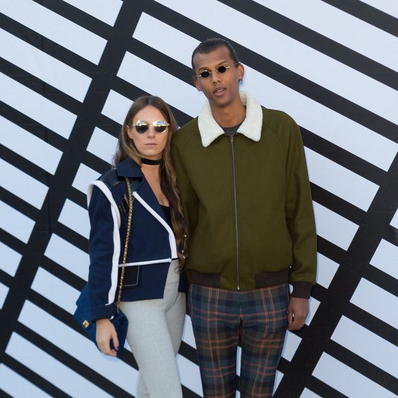 Stromae et son épouse Coralie Barbier assistant au défilé de la collection Prêt-à-porter printemps-été 2016/2017 de Louis Vuitton à Paris, France, le 5 octobre 2016. Photo Nicolas Genin/ABACAPRESS.COM