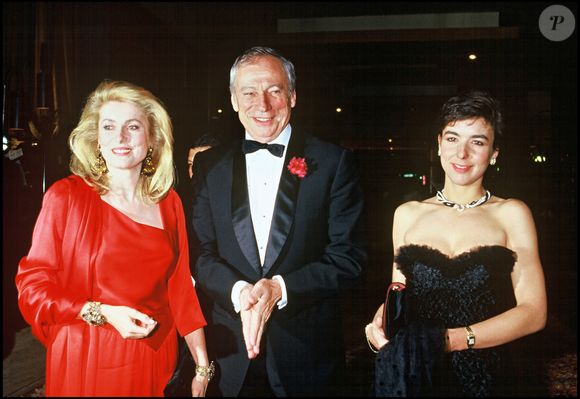 Yves Montand président du jury du festival de Cannes accompagné de son épouse Carole Amiel et de Catherine Deneuve en 1987. Crédit Angeli-Rindoff / Bestimage