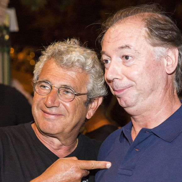 Le directeur artistique du festival Michel Boujenah et Philippe Chevallier lors du 29e Festival de Ramatuelle, à Ramatuelle, près de Saint-Tropez, dans le sud de la France, le 11 août 2013. Photo par Cyril Bruneau/ABACAPRESS.COM