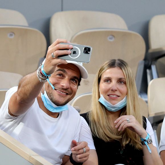 Amir Haddad et sa femme Lital - People dans les tribunes des Internationaux de France de Tennis de Roland Garros à Paris. Le 9 juin 2021. © Dominique Jacovides / Bestimage