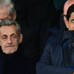 Nicolas Sarkozy, Nasser al-Khelaïfi - Célébrités dans les tribunes lors du match de Ligue des Champions entre le Paris Saint Germain contre Tottenham Hotspur Football Club (5-3) au Parc des Princes à Paris le 26 novembre 2025. © Christian Liewig/Bestimage