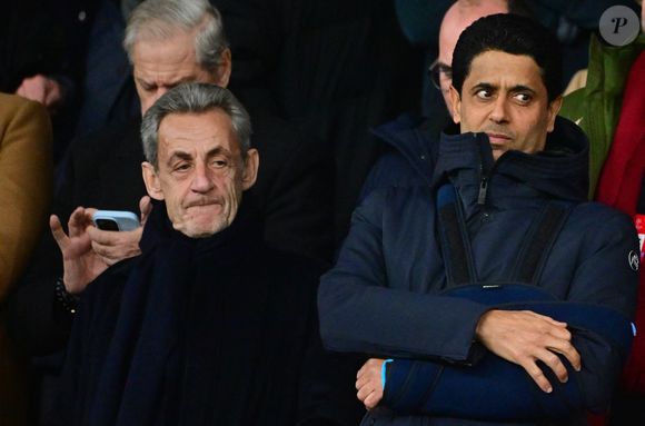 Nicolas Sarkozy, Nasser al-Khelaïfi - Célébrités dans les tribunes lors du match de Ligue des Champions entre le Paris Saint Germain contre Tottenham Hotspur Football Club (5-3) au Parc des Princes à Paris le 26 novembre 2025. © Christian Liewig/Bestimage