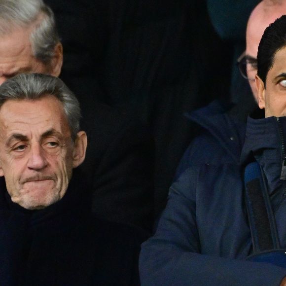Nicolas Sarkozy, Nasser al-Khelaïfi - Célébrités dans les tribunes lors du match de Ligue des Champions entre le Paris Saint Germain contre Tottenham Hotspur Football Club (5-3) au Parc des Princes à Paris le 26 novembre 2025. © Christian Liewig/Bestimage