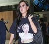 Il faut dire que "La Vie d'Adèle" a complètement bouleversé la vie d’Adèle Exarchopoulos. 

L'actrice française Adèle Exarchopoulos a été aperçue à son arrivée à l'aéroport de Nice avant le 79e Festival de Cannes, portant un ensemble entièrement noir composé d'un t-shirt graphique, d'un legging, d'un sac à bandoulière Lacoste et de mules noires. La star avait l'air à la fois confortable et chic alors qu'elle se préparait pour le festival sur la Côte d'Azur.