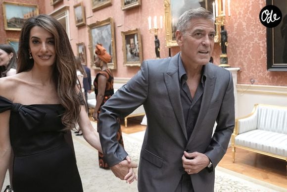 George Clooney et Amal Clooney assistent à une réception organisée par le roi Charles III à Buckingham Palace, à Londres, en l’honneur des lauréats des King's Trust Awards 2025, le 25 juin 2025.
Stefan Rousseau/WPA-Pool/Julien Burton via Bestimage