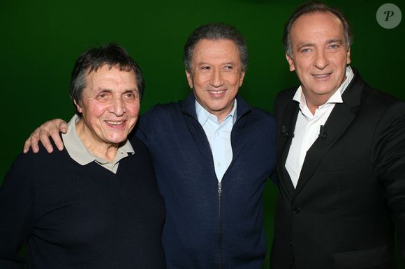 Producteur de l’émission Les grands du rire, Humbert Ibach a été important pour de nombreuses stars

Rétro - Décès Humbert Ibach (Mémé Ibach),  auteur-compositeur, grand producteur de télé et de disques, qui a mis Sheila et Karen Cheryl en pleine lumière - Meme Ibach (Humbert Ibach), Michel Drucker et Yves Lecoq - Tournage de l'emission "Les Grands du Rire" a Paris. Le 9 janvier 2014. JLPPA / Bestimage