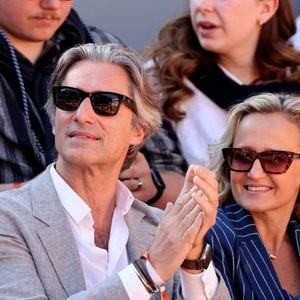 Laurent Solly et sa femme Caroline Roux - Célébrités dans les tribunes des Internationaux de France de tennis de Roland Garros 2024 à Paris le 7 juin 2024.  © Jacovides-Moreau/Bestimage