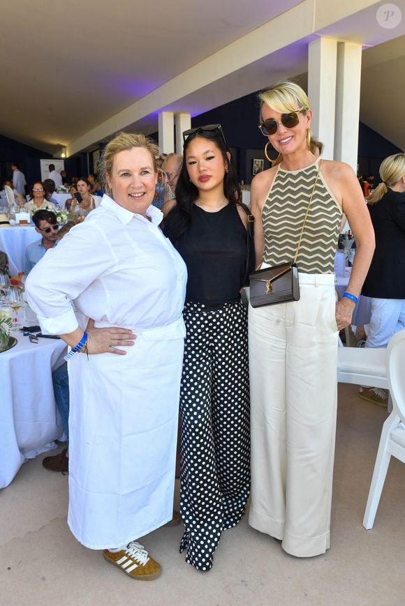 Exclusif - La cheffe Hélène Darroze, Laeticia Hallyday et sa fille Joy dans l'Espace VIP lors de la 9ème édition du "Longines Paris Eiffel Jumping" au Champ de Mars à Paris, France, le 25 juin 2023. © Perusseau-Veeren/Bestimage