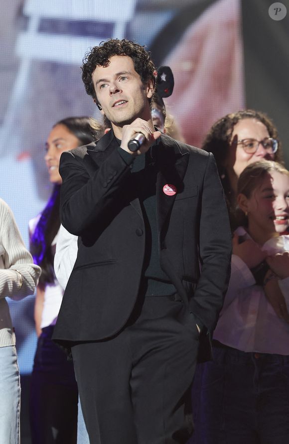 Exclusif - Michaël Gregorio lors du concert du gala de Noël de l'association Tout le monde contre le cancer fête ses 20 ans diffusé le 24 décembre sur M6 à l'Adidas Aren Porte de la Chapelle à Paris, France, le 4 décembre 2025. © Coadic Guirec/Bestimage