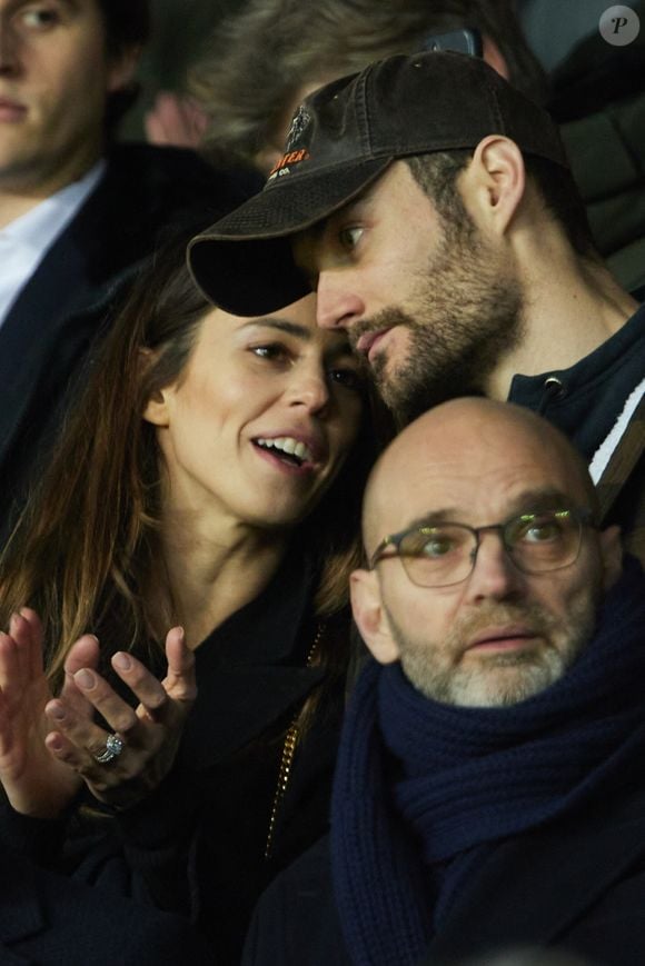 Exclusif - Louis Sarkozy et sa femme Natali Husic   - People en tribunes du match de Ligue 1 Uber Eats "PSG contre Reims" (1-1) au Parc des Princes à Paris le 29 janvier 2023. (AGENCE / BESTIMAGE).