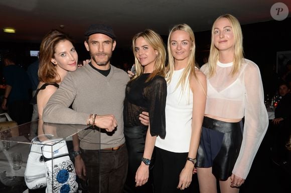 Exclusif - Sébastien Jondeau entre les jumelles Prisca et Jenna Courtin-Clarins et leurs cousines Virginie et Claire Courtin-Clarins - Anniversaire de Sébastien Jondeau (assistant personnel et égérie de Karl Lagerfeld) au restaurant La Gioia à Paris, le 18 mars 2015. Il fête ses 40 ans.