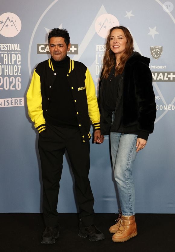 Jamel Debbouze et sa femme Mélissa Theuriau - Tapis rouge lors du 29ème Festival International du Film de Comédie de l'Alpe d'Huez le 21 Janvier 2026. © Dominique Jacovides/Bestimage