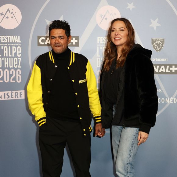 Jamel Debbouze et sa femme Mélissa Theuriau - Tapis rouge lors du 29ème Festival International du Film de Comédie de l'Alpe d'Huez le 21 Janvier 2026. © Dominique Jacovides/Bestimage
