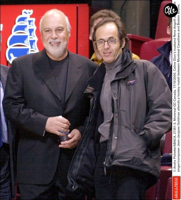 Le 17 octobre 2000. René Angelil, le mari de Céline Dion, et le chanteur et compositeur français Jean-Jacques Goldman assistent à un match de hockey opposant les Canadiens de Montréal aux Bruins de Boston. © André Pichette/ABACA