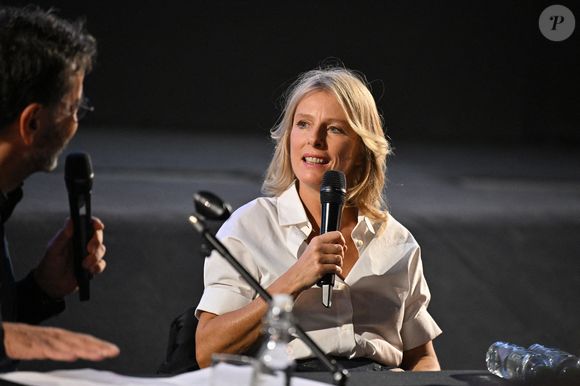 Karin Viard animant une Masterclass lors du 15e Festival du film Lumière à Lyon, France, le 16 octobre 2023.