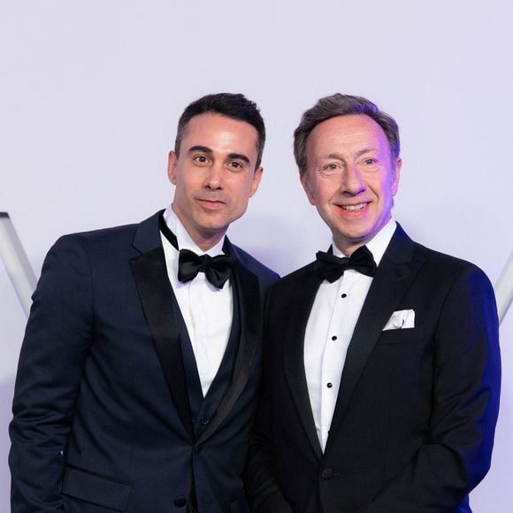 Stéphane Bern et son compagnon Yori Bailleres lors de la 70e édition du Bal de la Rose, au Sporting Monte-Carlo, à Monaco, le 21 mars 2026.

© Olivier Huitel/Pool Monaco/Bestimage