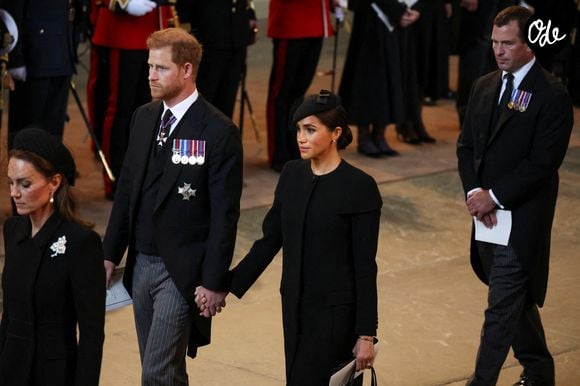 Catherine (Kate) Middleton, princesse de Galles, Le prince Harry, duc de Sussex et Meghan Markle, duchesse de Sussex - Intérieur - Procession cérémonielle du cercueil de la reine Elisabeth II du palais de Buckingham à Westminster Hall à Londres, où les Britanniques et les touristes du monde entier pourront lui rendre hommage jusqu'à ses obsèques prévues le 19 septembre 2022. Le 14 septembre 2022